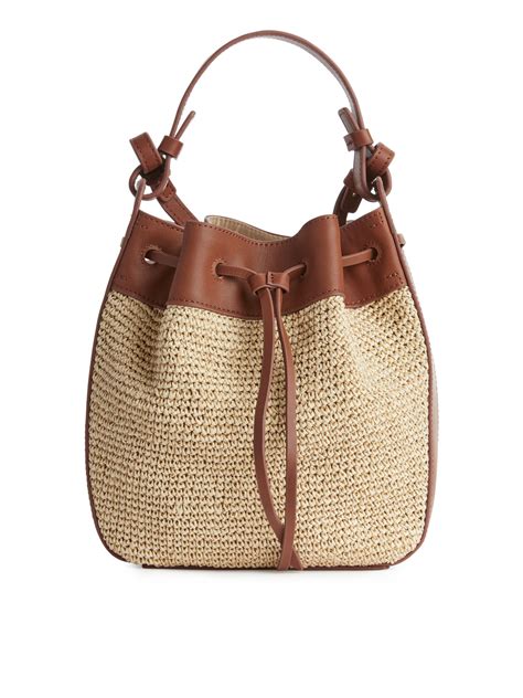 Leather mesh and straw bucket bag Beige/cognac 